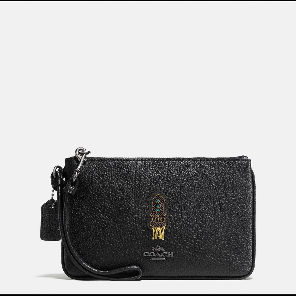 Coach wristlet pouch in black grain leather with souvenir embroidery